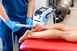 shockwave behandling under fod hos ultimate body coach